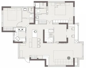A floor plan of a modern residential interior with two bedrooms, a living area, and a kitchen.