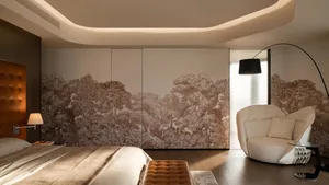 A modern bedroom with a scallop ceiling and tree wallpaper design
