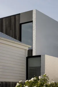 A modern architectural structure featuring brick materials.