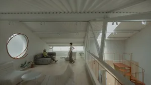 Modern apartment with metal balcony and circular window