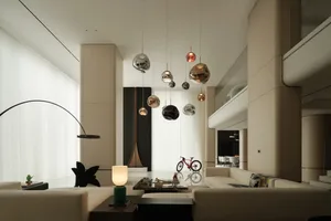 A modern interior living room featuring neutral tones and minimalist décor.