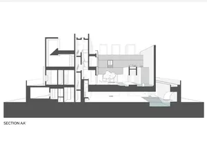 Modern building's architectural cross-section with gray lines on a white background.