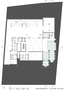 Basement-level architectural layout with various functional zones and car parking.