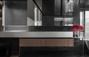Modern minimalist bathroom with dark metallic black tiles and metallic accents, featuring a sleek floating vanity with wooden
