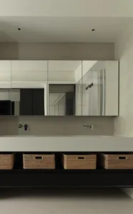 Modern bathroom featuring polished concrete floor and minimalist design