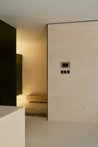Minimalist lobby with marble walls and floor