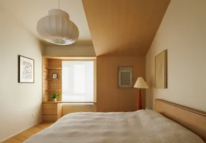 A modern minimalist bedroom featuring a bed with white fabric bedding and wooden headboard, along with a wooden floor and cei