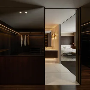 A modern residential bedroom suite featuring high-quality materials and sleek design.