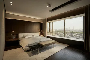 Modern, minimalist bedroom featuring a king-sized bed, mounted lamps, and a large window overlooking the cityscape.