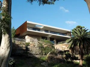 Modern residential house featuring concrete and glass materials