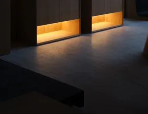 Floating wooden office desk with warm lighting.