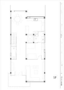 Modern residential floor plan showing the layout of a house's ground floor with a living room, dining area, kitchen, bathroom