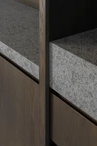 Concrete cabinet detail showcasing sleek, minimalist design with clean lines and texture.