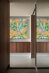 Metallic accent feature against the wall in a modern interior design setting.
