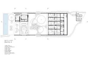 A detailed architectural plan of the ground floor of a building, showing rooms and outdoor spaces.