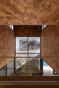 Modern interior space featuring contemporary design with wood materials.