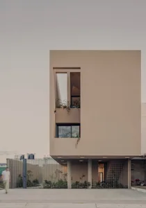 Modern residential building with sandstone exterior