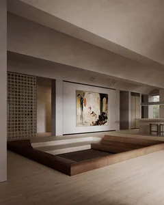 A minimalist living room featuring a concrete seating area with a large abstract painting on the wall.