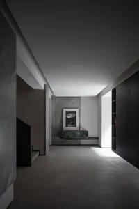 A modern living room featuring marble elements.