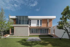 A modern residential building featuring glass, timber, and concrete materials.