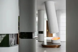 Modern interior design featuring minimalist white concrete elements.
