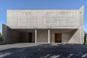 Modern concrete box house with简约线条设计