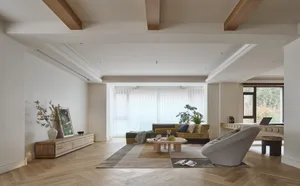 A modern minimalist living room featuring wood flooring and furniture, with a large window and plants.