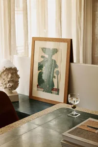 A modern interior setting featuring a concrete frame artwork in a contemporary space.