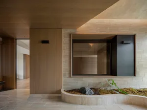 Modern interior design featuring concrete and brick materials