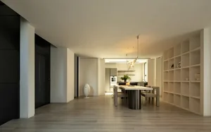 Modern living, dining, and kitchen room interior with minimalist decor and open space layout.