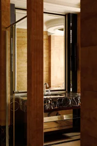 Modern bathroom with marble features, showcasing contemporary design elements.