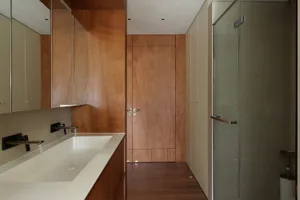 Modern bathroom featuring wooden elements