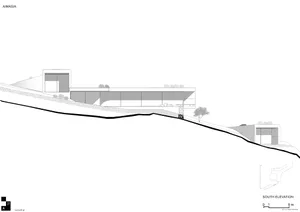 Modern house with glass facade and concrete structure.