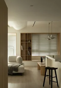 Contemporary living room featuring wood and marble elements.