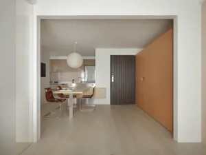 Modern kitchen and dining area with wooden finishes and contemporary furniture.