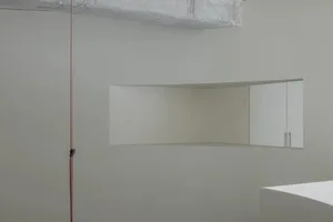 Minimalist office space featuring concrete and metal materials