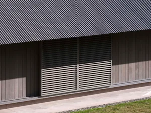 A minimalist garage door with a metal exterior.