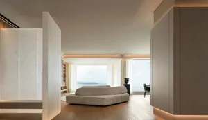 Modern minimalist living room with contemporary seating and lighting