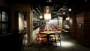 Industrial-style restaurant interior with wooden and metallic elements