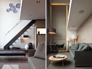 Modern living room featuring concrete walls, wooden furniture, and cloth upholstery on a couch and bench.