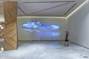 Minimalist artistic installation featuring concrete sculptures in a gallery setting