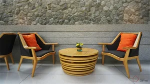 Modern coffee shop with wooden furniture and orange cushions