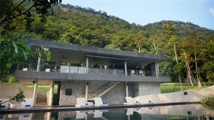 Modern house with pool and concrete and glass design elements