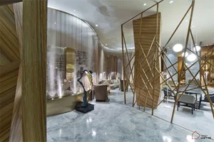 An elegant and contemporary lobby with metal and glass panel decor
