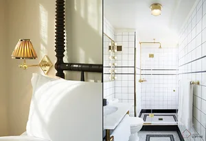 A modern bedroom and bathroom featuring white tiles, metal finishes, and a sleek, contemporary design.