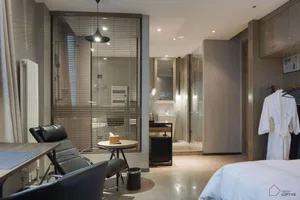 A modern hotel suite with contemporary metallic blinds in a minimalist design.