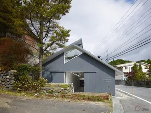 A modern house with a metal siding exterior.