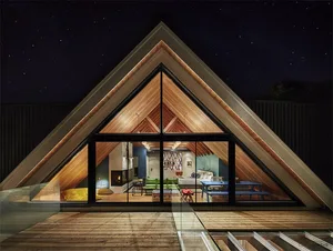 Modern interior with glazed glass walls at night