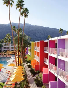 A vibrant, contemporary hotel exterior adorned with various brightly colored panels.