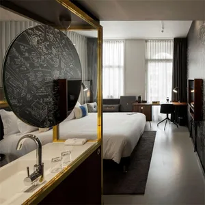 A modern hotel room featuring wood, glass and metal elements.